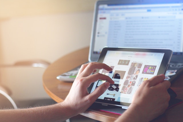 woman using multiple devices